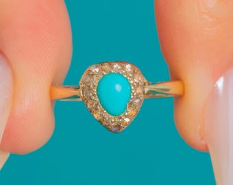 9 karat guldring med turkos diamant och hjärtformad diamant