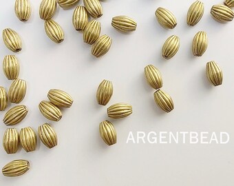 25 Stück gewölbte ovale Spacer-Perlen aus Rohmessing (4 x 6 mm) zur Schmuckherstellung Argentbead 22AG0002