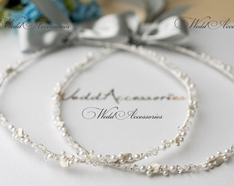 Handgemaakte Stefana gemaakt van porseleinen bladeren, kristallen en parels