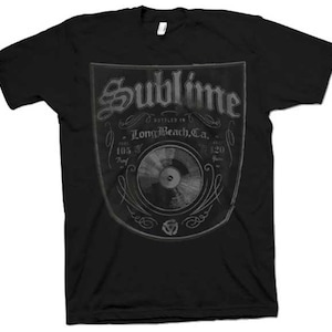 May include: Black t-shirt with a vintage-style graphic of a record, the text "Sublime", and the words "Bottled in Long Beach, Ca."