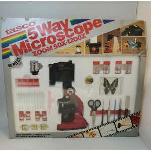 May include: A red and black 5-way microscope kit with a 50x-1200x zoom. The kit includes 46 pieces, including slides, tweezers, and a butterfly specimen.
