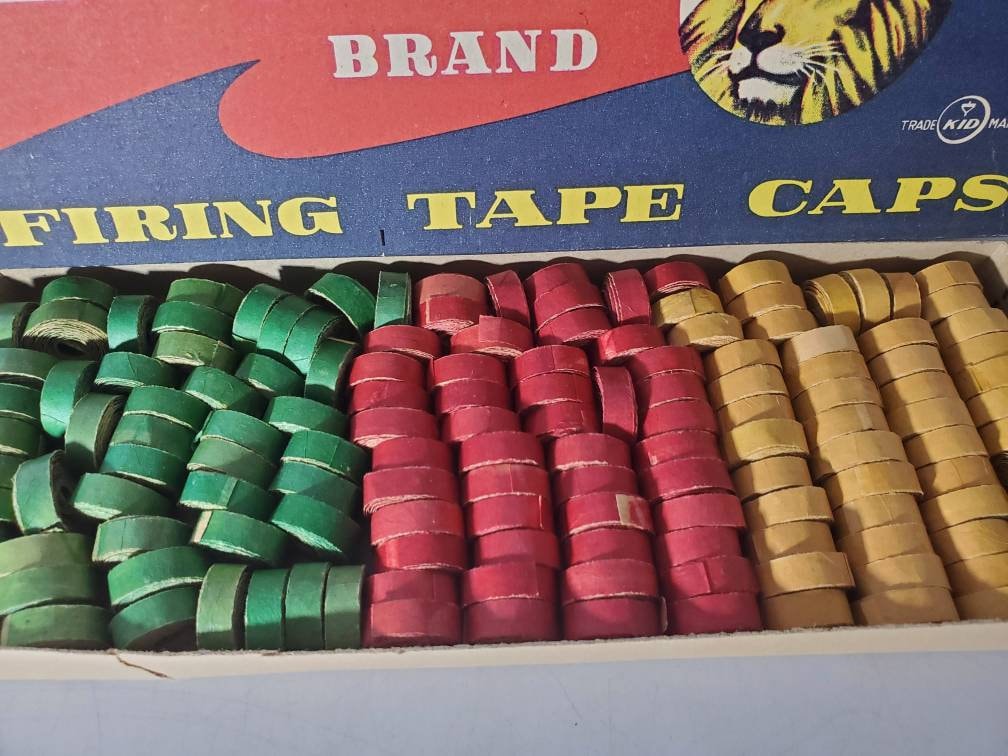 Vintage Lion Brand Firing Tape Caps Display with 21 Packs RARE Pretend