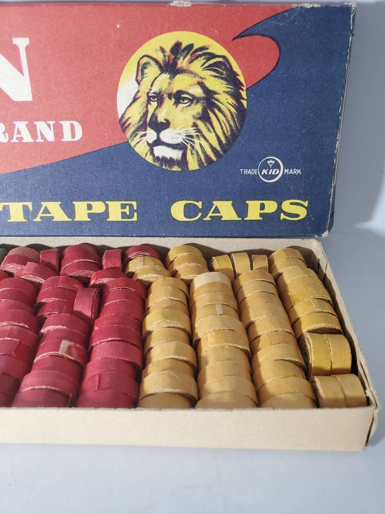 Vintage Lion Brand Firing Tape Caps Display with 21 Packs RARE Pretend
