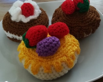 3 crocheted cupcakes