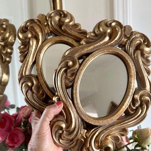 Ornate Oval Mirrors