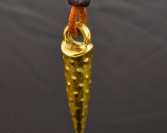 Embrace Your Tribal Side with a Bronze Pendant Featuring Medieval and Organic Design Elements