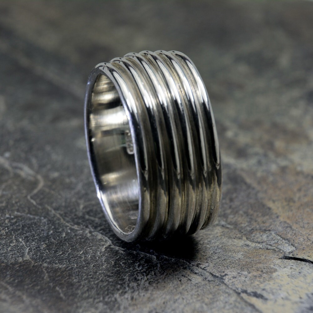 Revolutions: A Bold and Elegant Sterling Silver Ring With