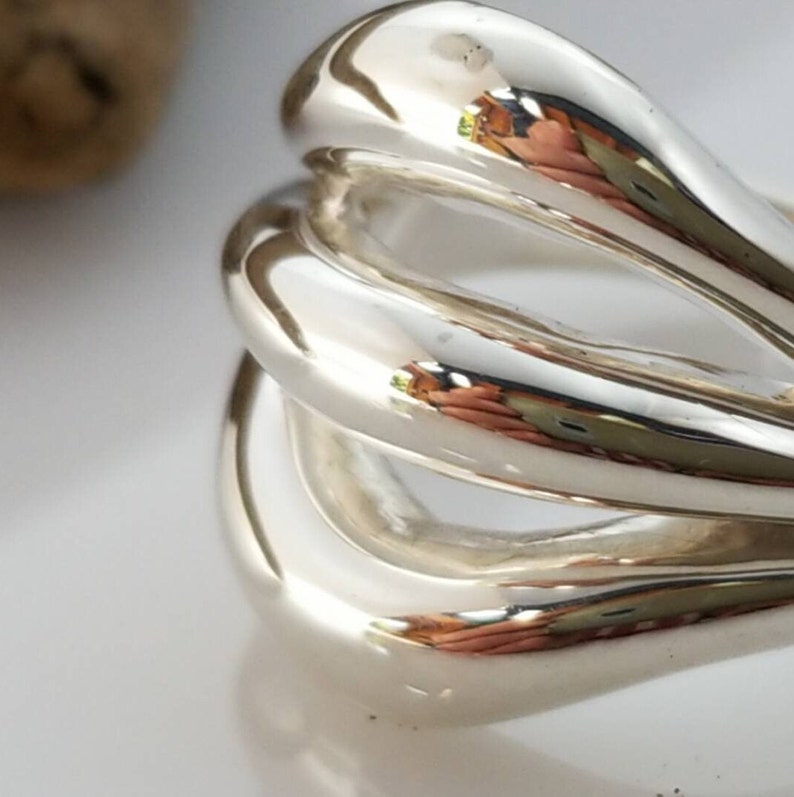 Trinity Radiance: Sterling Silver Triple Loop Statement Ring image 9