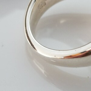 Trinity Radiance: Sterling Silver Triple Loop Statement Ring image 10