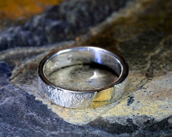 Sterling silver band with 14K gold facet inlay