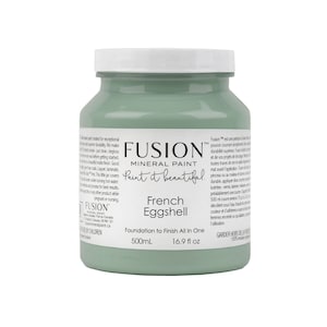 May include: A green 16.9 fluid ounce bottle of Fusion Mineral Paint in the color French Eggshell. The bottle is labeled "Foundation to Finish All in One".