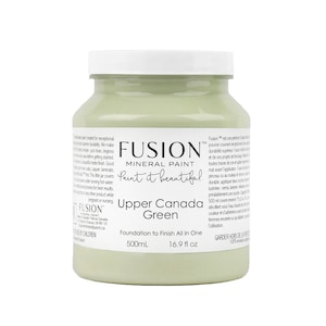 May include: A 16.9 fluid ounce bottle of Fusion Mineral Paint in the color Upper Canada Green. The bottle is labeled "Paint it beautiful." and "Foundation to Finish All in One".