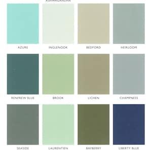 May include: A color chart with 18 paint color swatches. The swatches are arranged in a grid of 3 columns and 6 rows. The colors include shades of blue, green, beige, and white. The names of the colors are listed below each swatch.