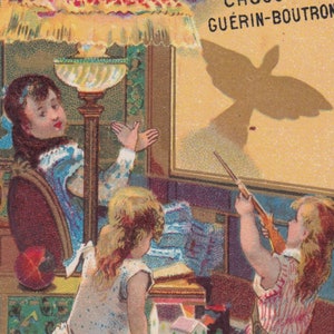 Condição TOP - fantoche de sombra / pássaro - cartão comercial vitoriano francês c. 1895 - Guerin Boutron Paris - jogo de caça fashion girl - Minot vintage