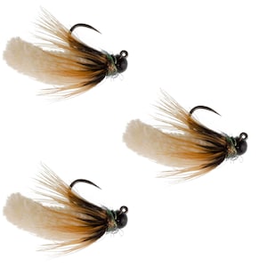 May include: Three fishing flies featuring a black metal hook head, a cream-colored fuzzy body, and brown and black feathers extending from the base of the hook. Each fly is constructed with a small black bead at the eye of the hook.