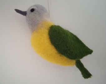 May include: A felt bird ornament with a grey head, yellow body, and green wings. The bird is hanging from a white string.