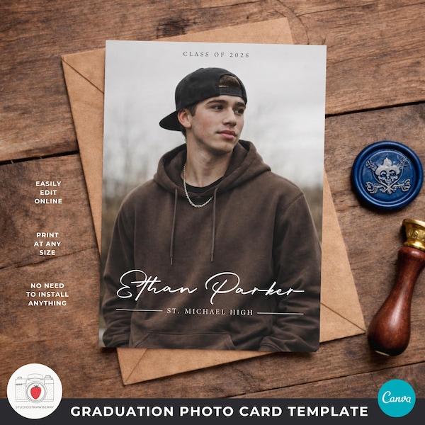 May include: A graduation photo card template featuring a young person in a brown hoodie and a black cap. The card includes the text "Class of 2026", the name "Ethan Parker", and "St. Michael High". The card is on a wooden surface.