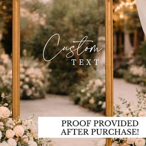 May include: A gold-framed archway with the word "Custom" in elegant script. The word "TEXT" is below. The archway is surrounded by white fabric, flowers, and lanterns, creating a romantic, wedding-like atmosphere. The text "PROOF PROVIDED AFTER PURCHASE!" is at the bottom.