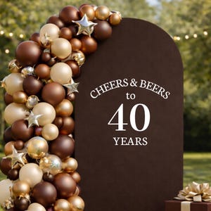 May include: A brown arch with the text "Cheers & Beers to 40 Years" is decorated with a balloon garland in shades of brown, gold, and cream, accented with star-shaped ornaments. A gift box is visible in the bottom right.
