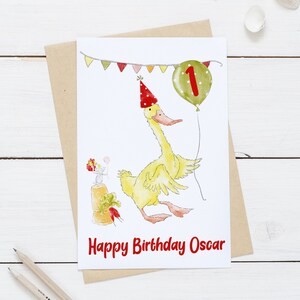 Carte de 1er anniversaire avec motif souris et canard avec papier d'emballage assorti.