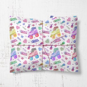 May include: White gift wrap with a repeating pattern of colourful roller skates, candy and butterflies. The paper is tied with a pink ribbon.