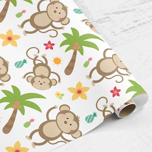 May include: White wrapping paper with a repeating pattern of brown monkeys, green palm trees, yellow flowers, and pineapples. The monkeys are in various poses, some swinging from vines and others holding pineapples.