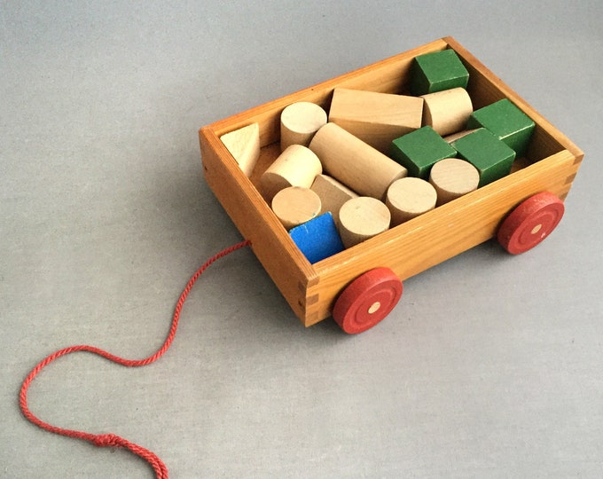 wooden building blocks in little trailer