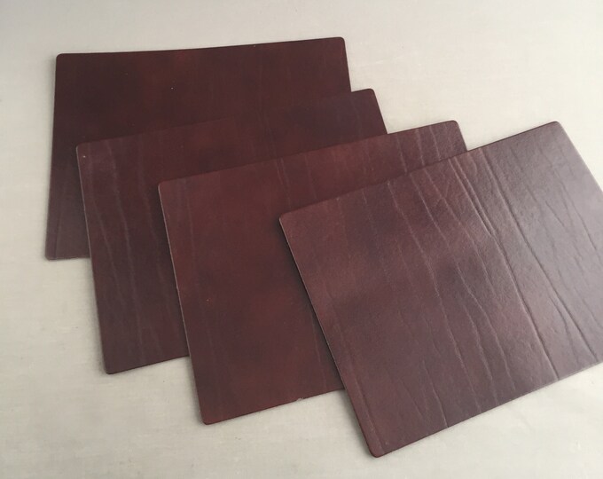 leather place mats x 4