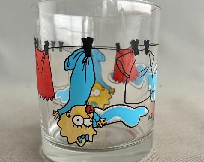 Maggie Simpson hanging on the washline collectable glass
