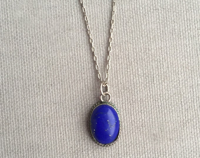 Lapis lazuli and silver pendant on silver chain