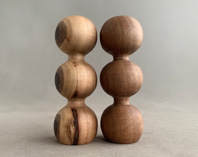 Pair of hand turned wooden candlestick holders