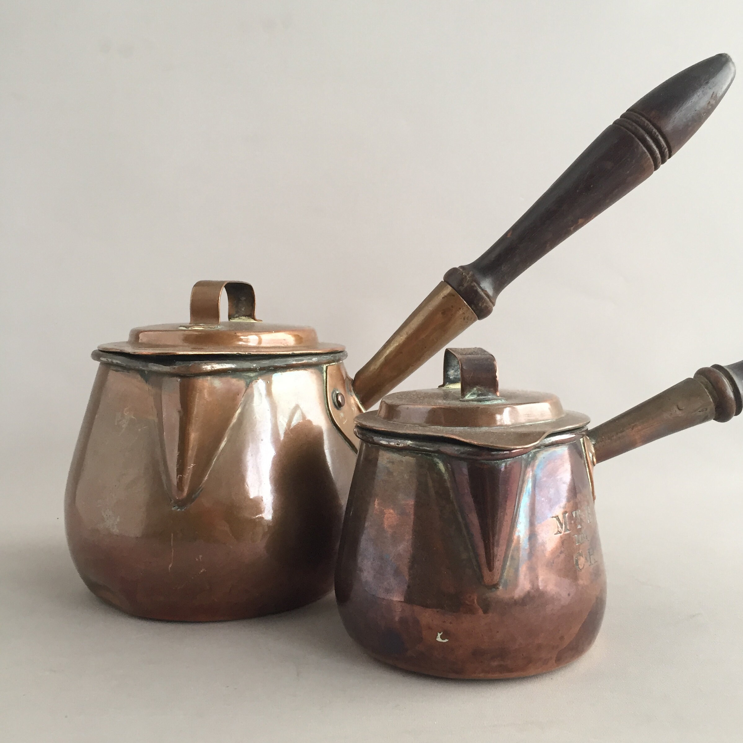 Decorative old copper lidded pot