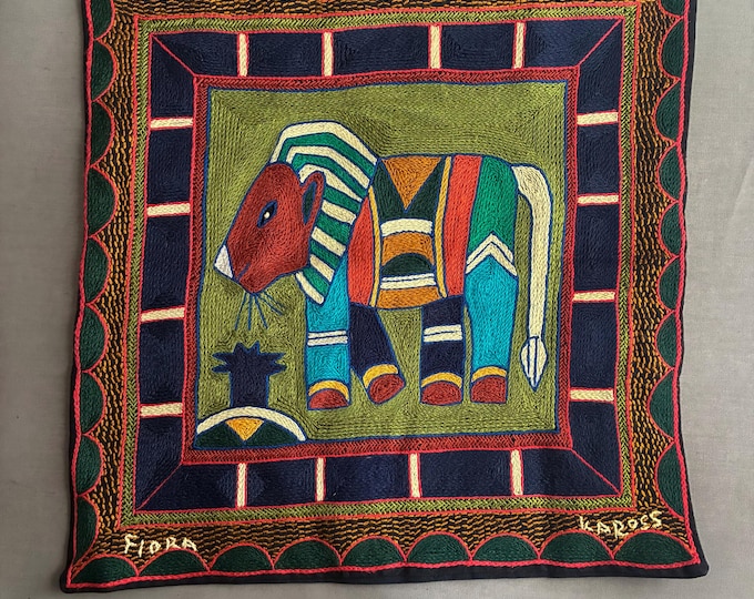 hand-embroidered textile lion cushion cover