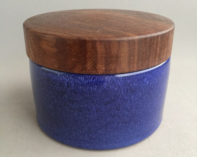 ceramic jar with wooden lid