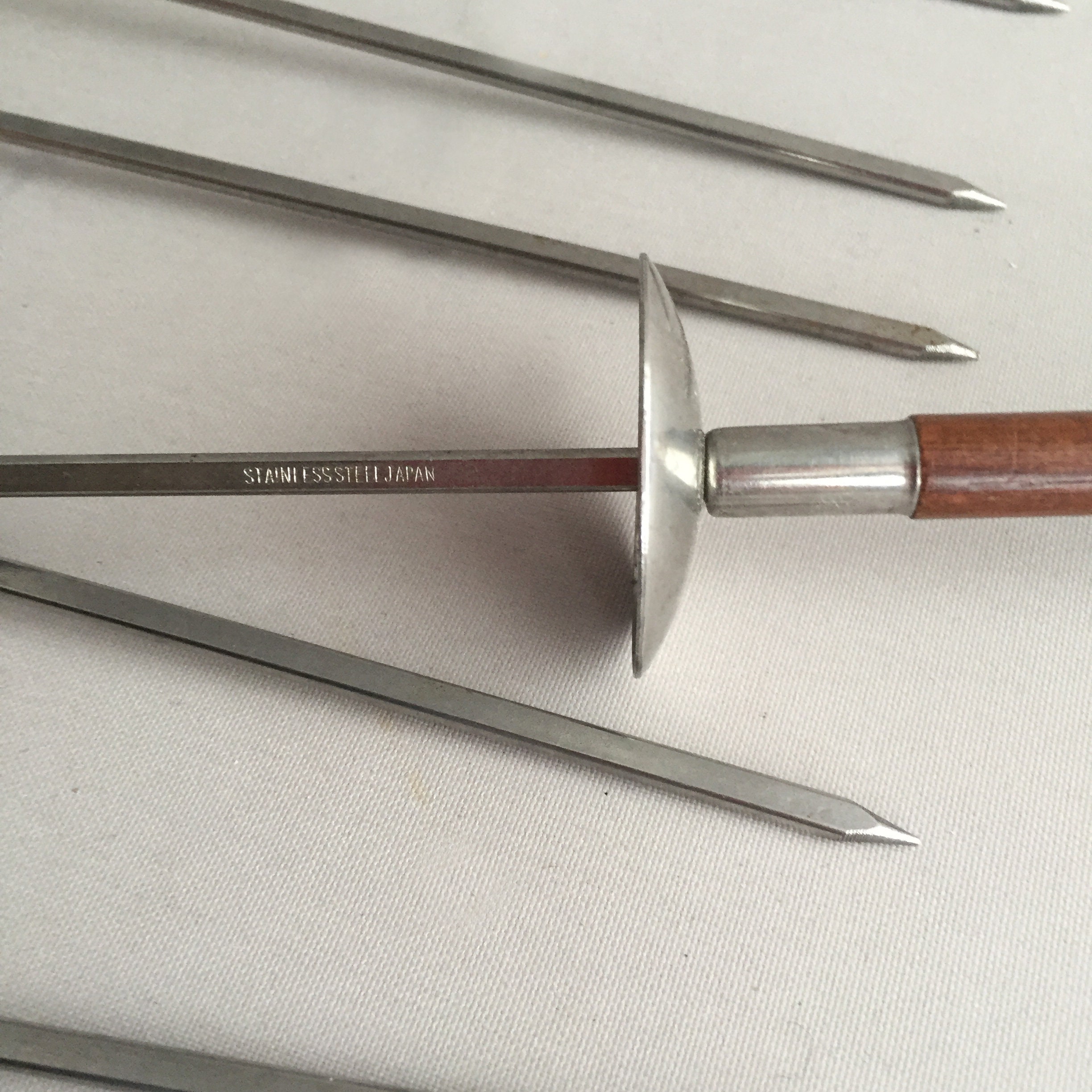 Vintage stainless steel and wood kebab sticks