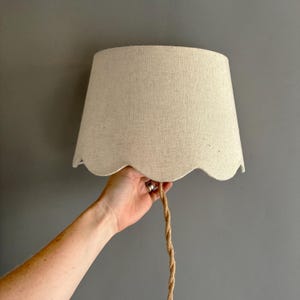 wall hung scalloped sconce  lampshade with switch on plug in cable