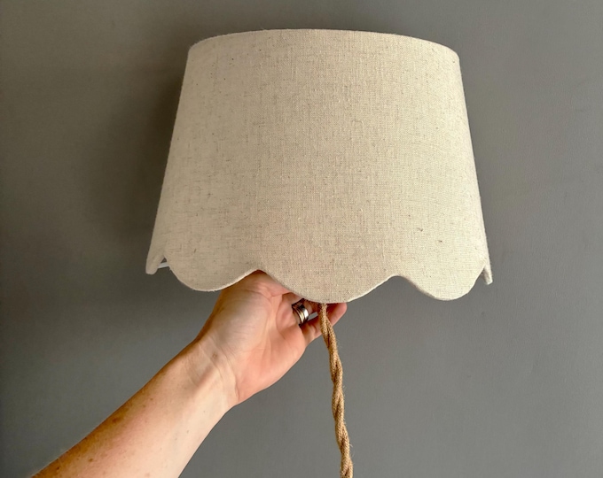 wall hung scalloped sconce  lampshade with switch on plug in cable