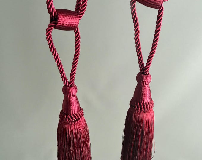 Burgundy satin tasseled curtain tie backs