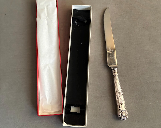 ornate stainless steel cake knife in original box