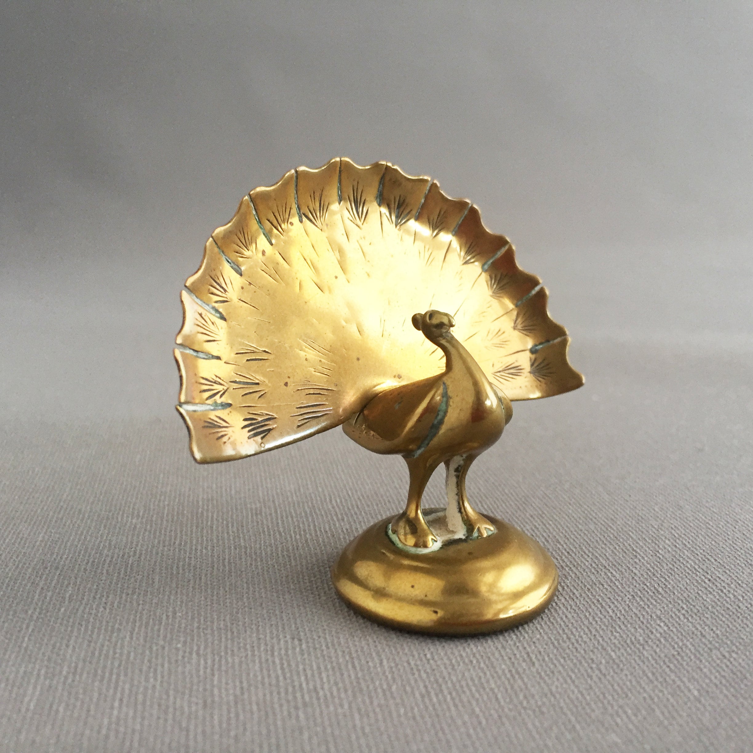 brass ornamental peacock