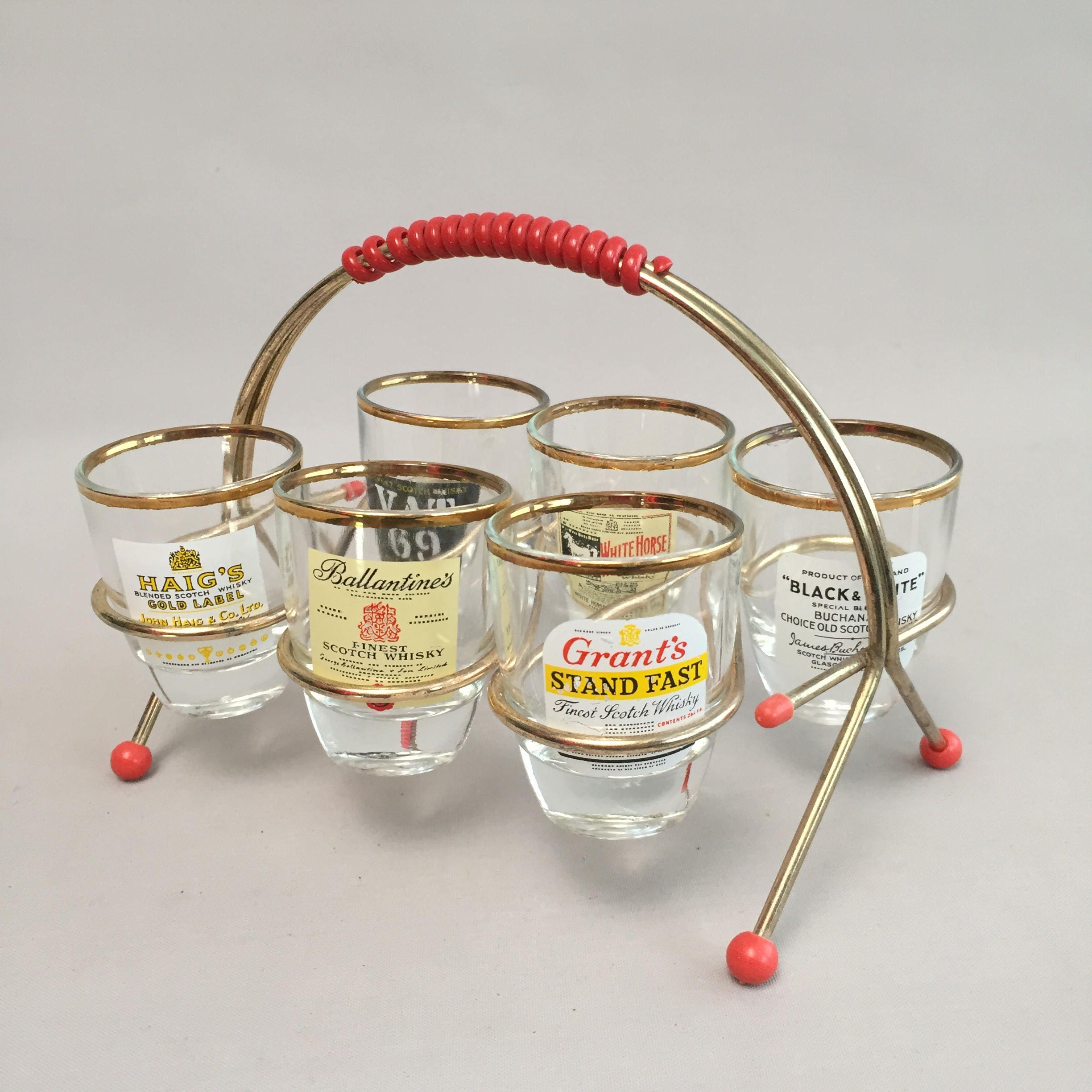 1950s drinks set whisky glasses in atomic glass holder