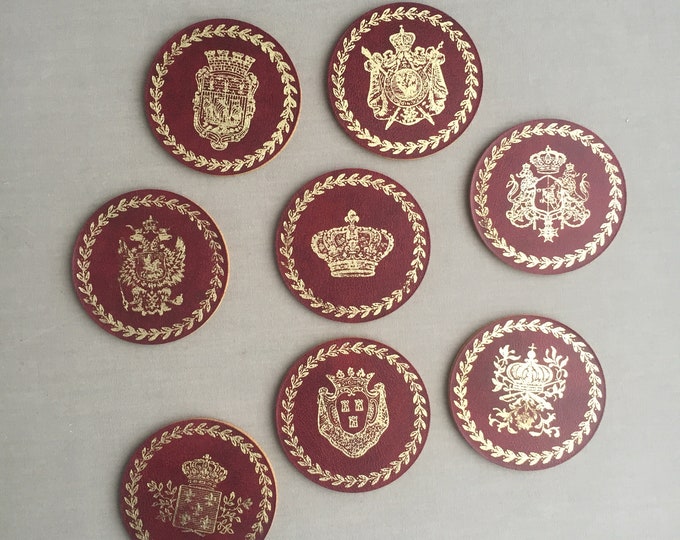 vintage gilt embossed Swedish coat of arms coasters