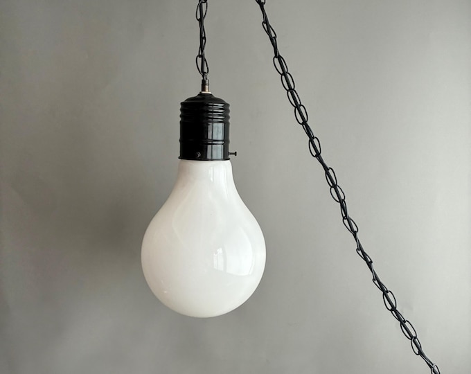 Ingo Maurer style pop art oversized giant hanging light bulb on black chain