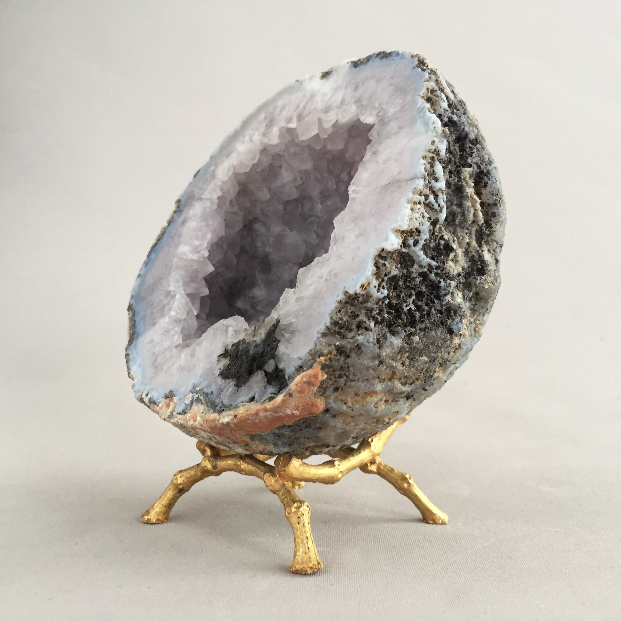 Agate decorative geode on gold stand