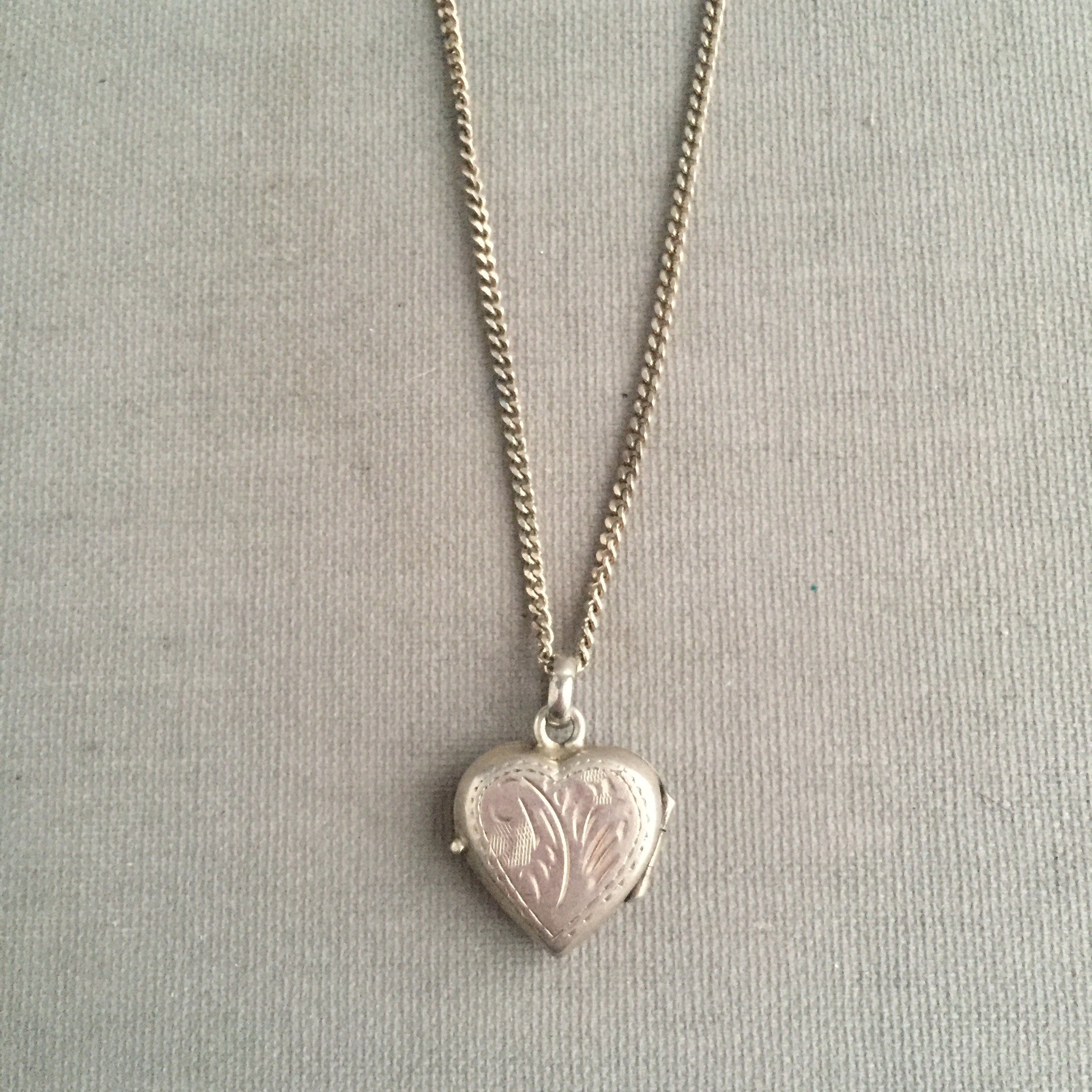 silver heart locket on silver chain