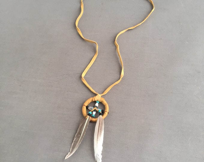 Navajo crafted suede medicine wheel pendant