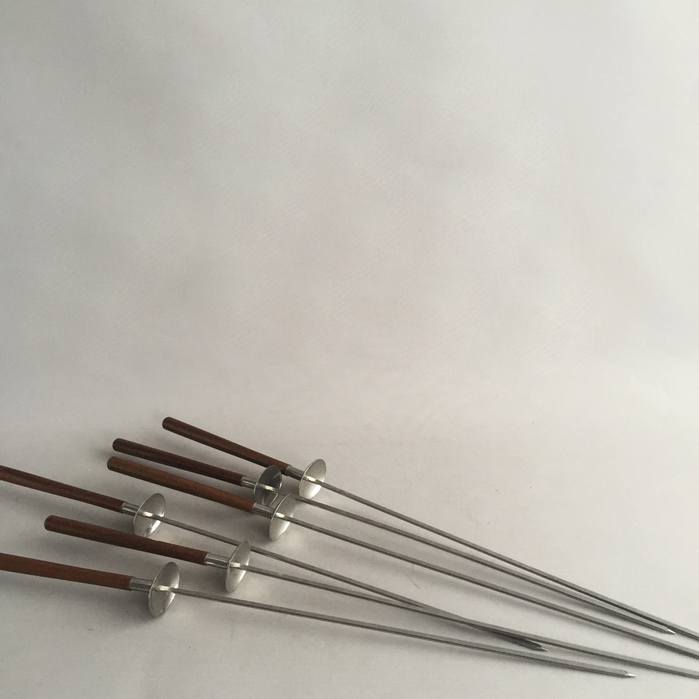 Vintage stainless steel and wood kebab sticks