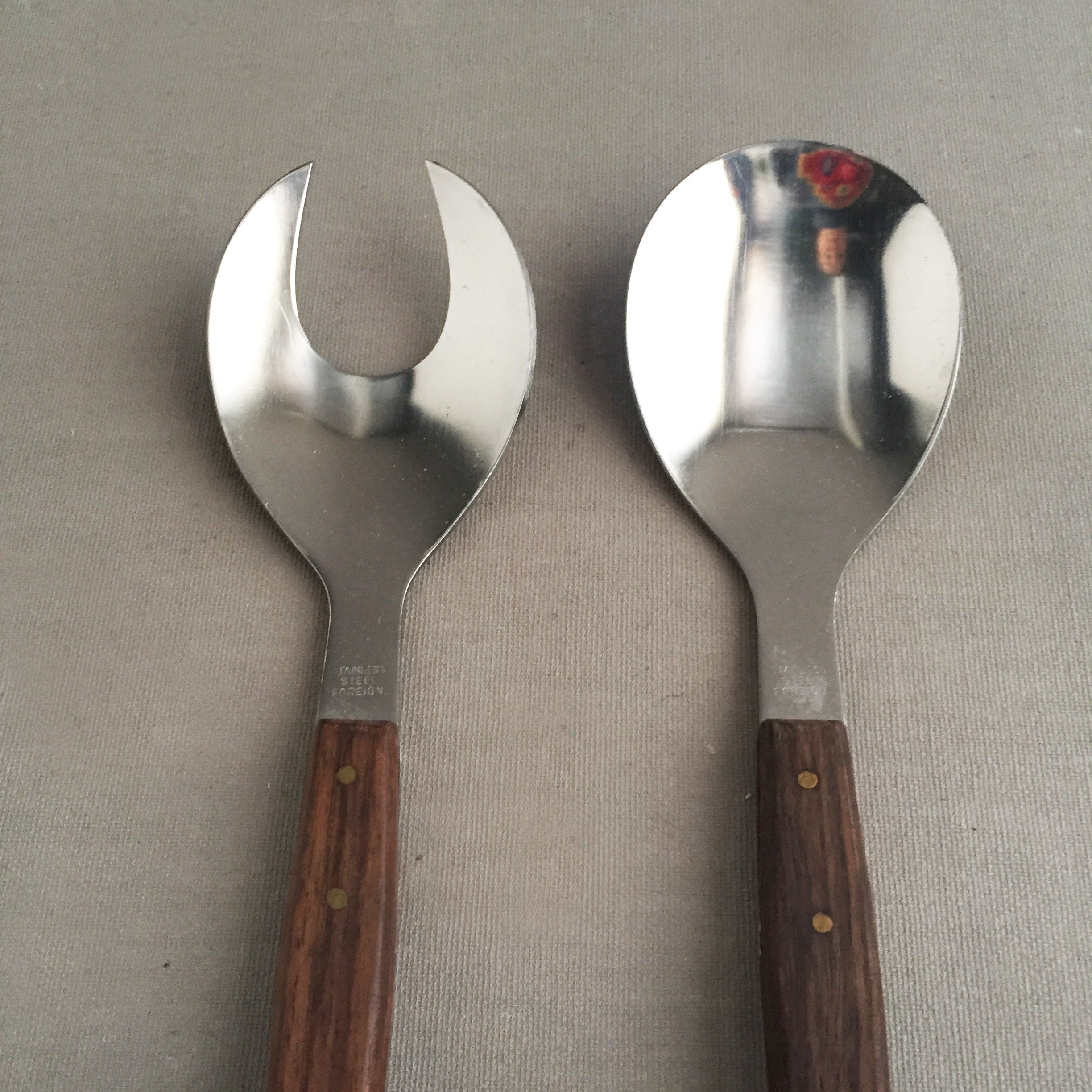 steel and wood salad servers