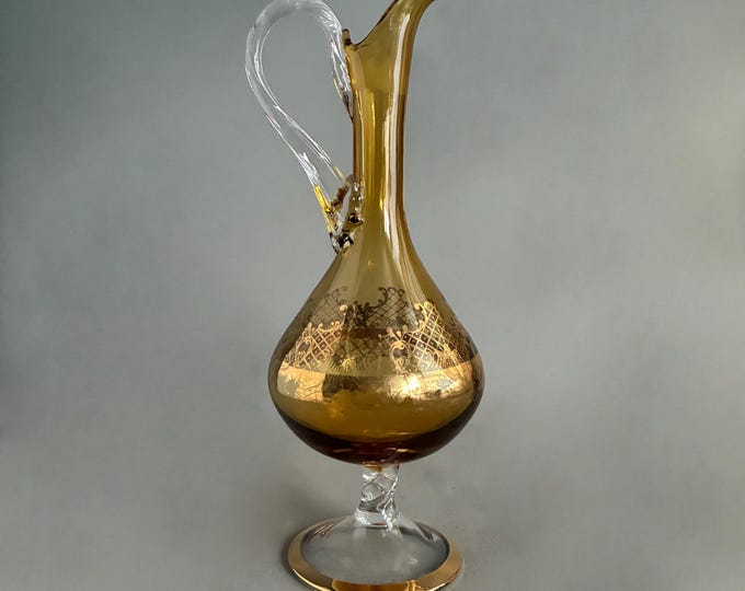 mid-century modern amber glass decanter with gold detail