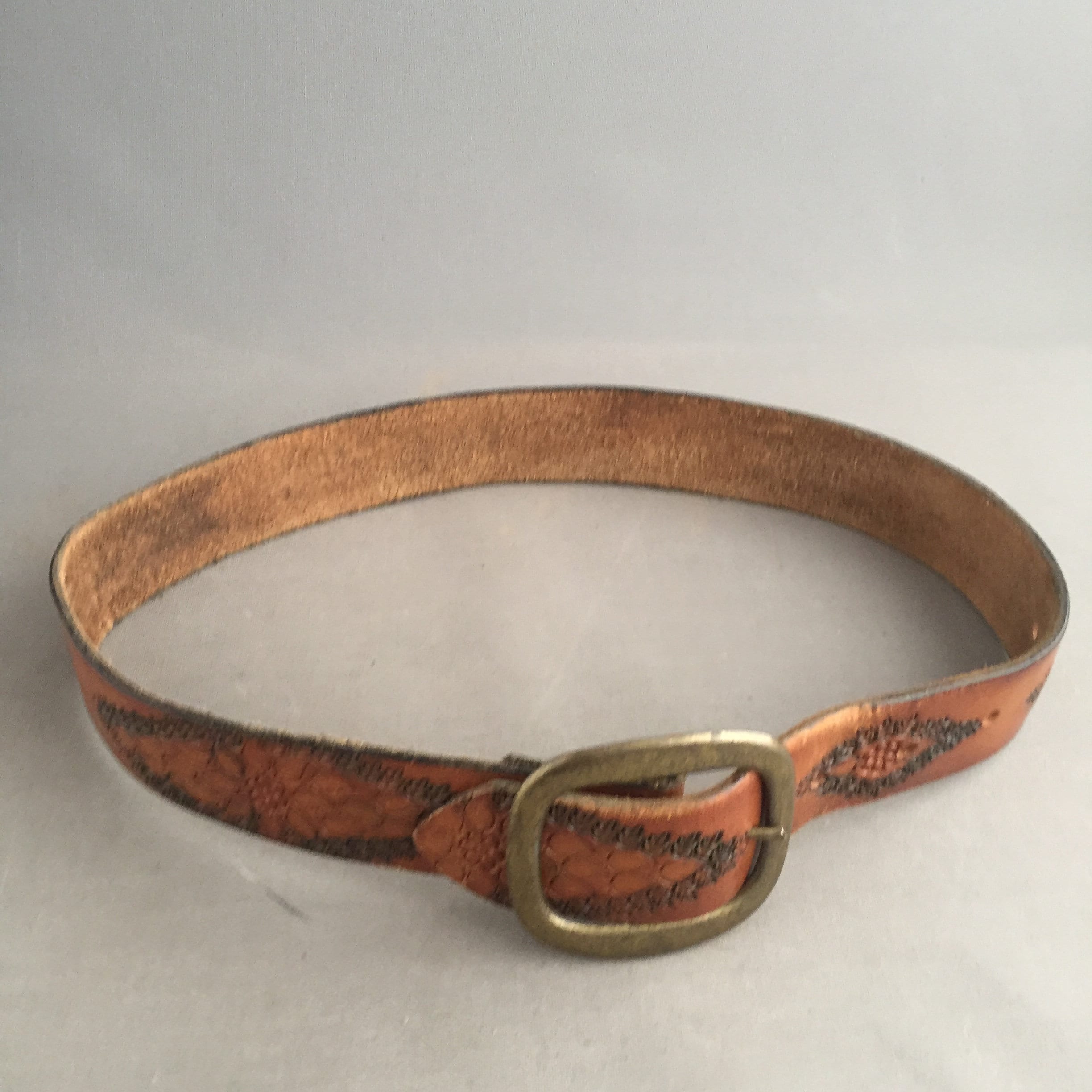 1970s tooled leather belt